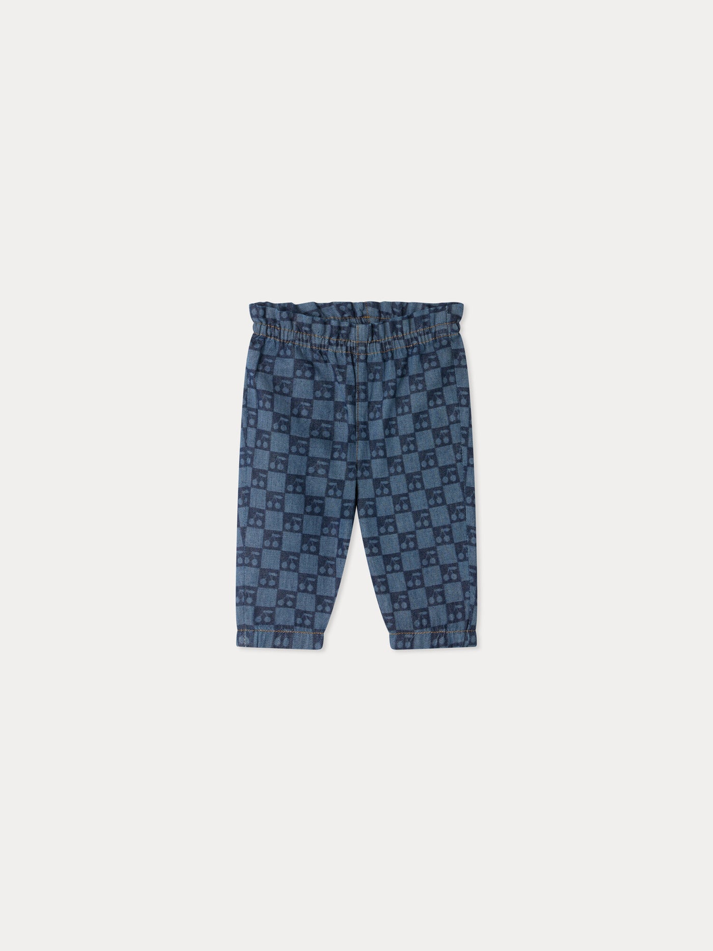 Luciole baby trousers with a cherry chequerboard pattern, made from organic cotton