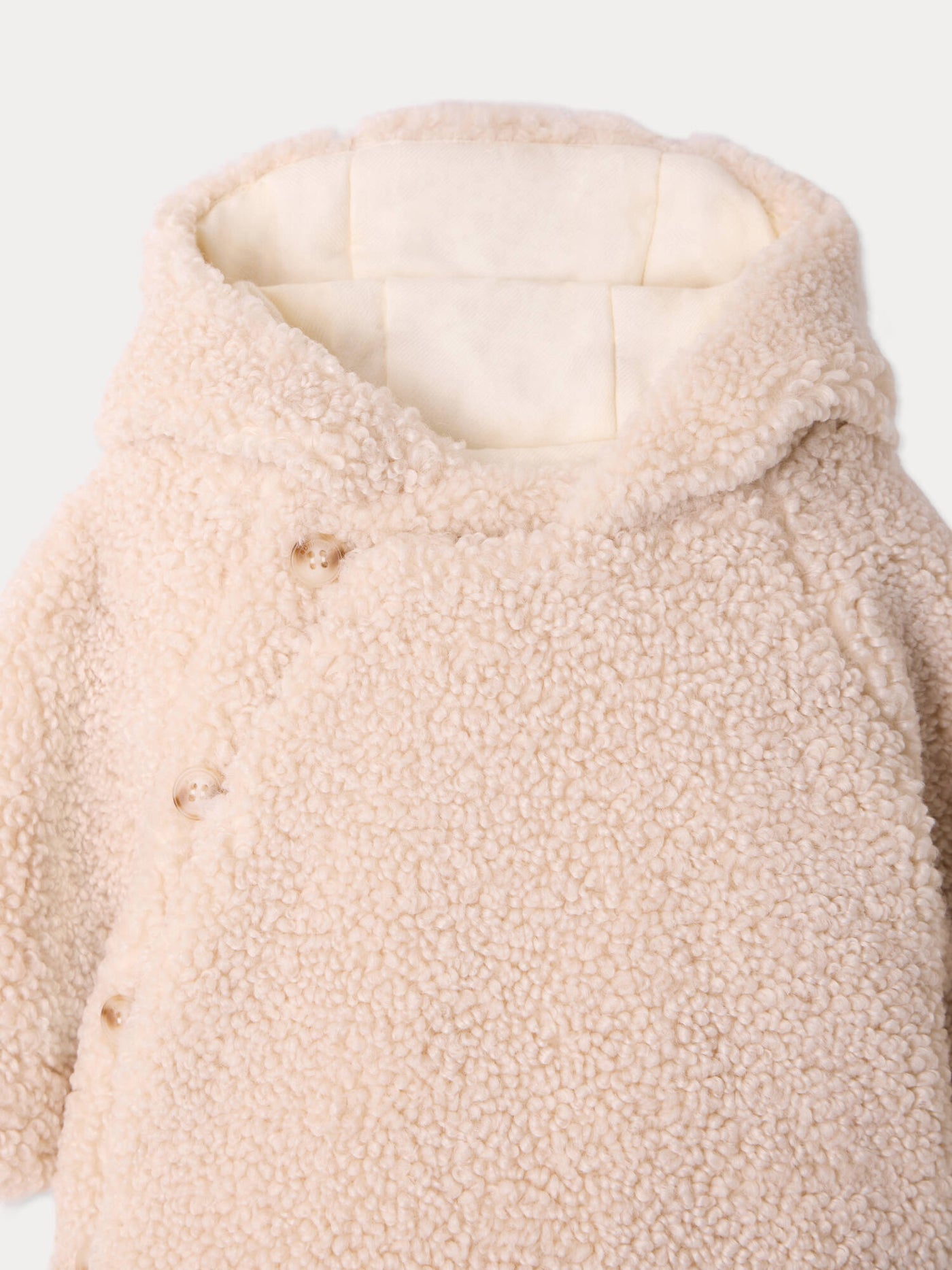 Thala baby jacket in faux fur