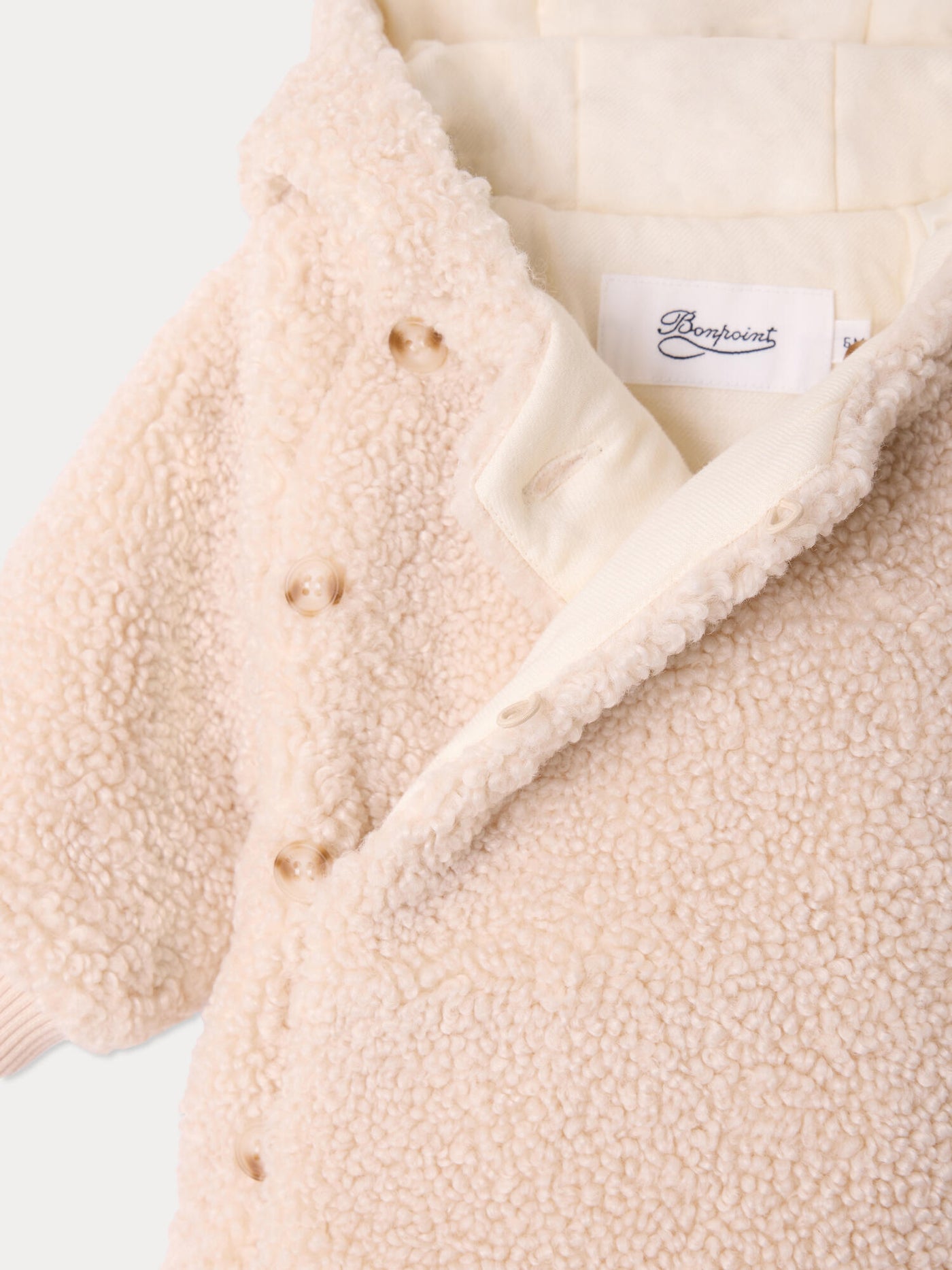 Thala baby jacket in faux fur